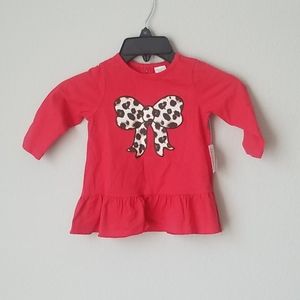 starting out  ( brand )  red infant shirt .